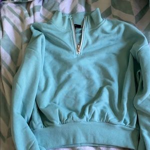 Cropped quarter zip pull over